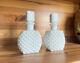 A Set Of Two White Perfume Bottles / Liquid Holders With Lids