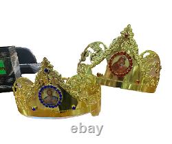 Golden Byzantine Orthodox wedding crowns set of two in Christian church