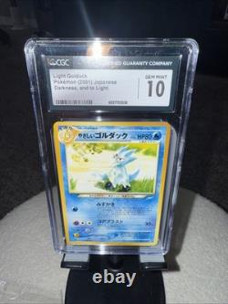Light Gold Duck Pokémon 2001 Japanese Darkness, And Two Light CGC 10