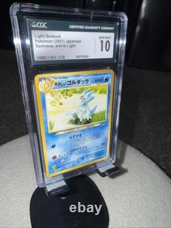 Light Gold Duck Pokémon 2001 Japanese Darkness, And Two Light CGC 10