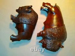 Set of two (2) carved wooden Ironwood buffalo adult and youth sculpture