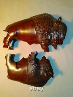 Set of two (2) carved wooden Ironwood buffalo adult and youth sculpture