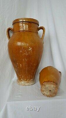 Set of two old Italian amphora shaped jars