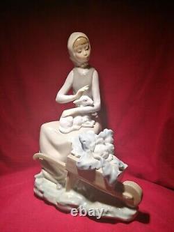 Set two lladro figurines girl with lamb and boy with lamb