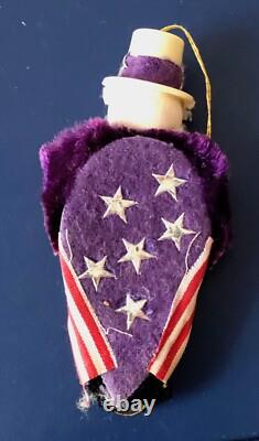 This listing is for a rare set of two (2) authentic Uncle Sam patriotic ornament