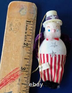 This listing is for a rare set of two (2) authentic Uncle Sam patriotic ornament