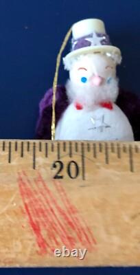This listing is for a rare set of two (2) authentic Uncle Sam patriotic ornament