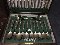 Two Sets of Vintage Cutlery 64 Pieces