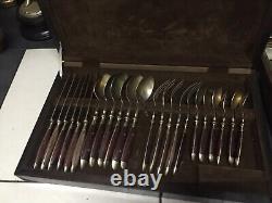 Two Sets of Vintage Cutlery 64 Pieces