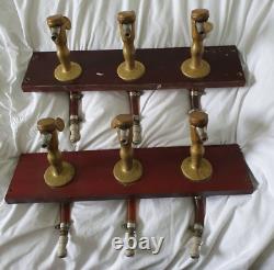 Two sets of Three Wood Mounted Brass Beer Taps