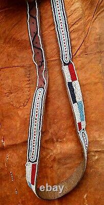 Vintage Maasai Tribe leather beaded skirt, apron and belt, Kenya 1950s. Two sets