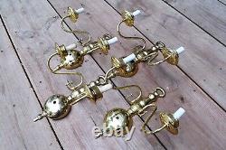 Vintage set of 4 two arm brass sconces
