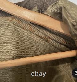 WWII and Korean War Ike Jacket 38L with Patches, Chevron & Two set discs named