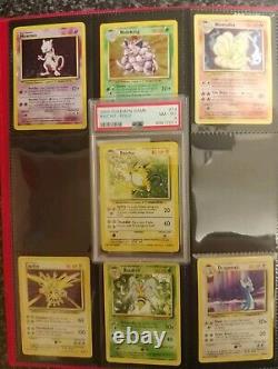 Collection de cartes Pokémon de la série de base Ex/Nm Charizard et deux PSA 8 Holos presque complètes (94/102)