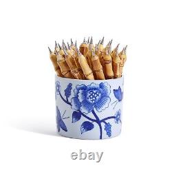 En français : Ensemble de deux stylos en bambou naturel avec pot de fleurs bleu - 36 pièces