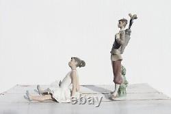 Ensemble De Deux Figurines Lladro Golfer, Attendant De Tee Off Et Nao Amusing Ballet