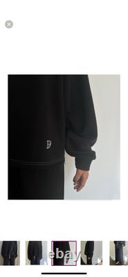 Ensemble EDK pour femmes, taille XS pour le sweatshirt, taille M pour le pantalon.