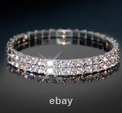 Ensemble de bijoux Swarovski Elements : collier choker à deux niveaux, bracelet tennis, boucles d'oreilles puces