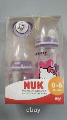 Ensemble de deux biberons et une sucette Hello Kitty Nuk en violet