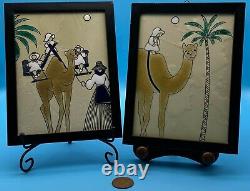Ensemble de deux carreaux muraux décoratifs vintage avec un design de chameau encadré.