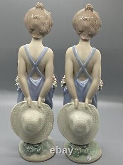 Ensemble de deux figurines Lladro Pocket Full Of Wishes #7650, en parfait état.