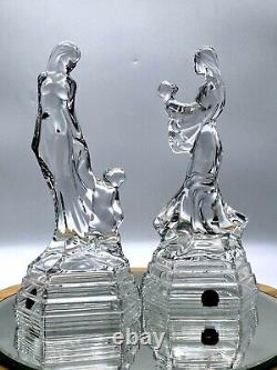Ensemble de deux magnifiques figurines en verre taillé, représentant une dame avec un enfant, fabriquées en Italie.