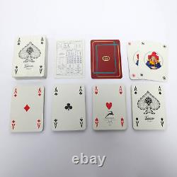 Ensemble de deux paires de cartes à jouer Gucci avec logo G entrelacé de la ligne Sherry en bordeaux.