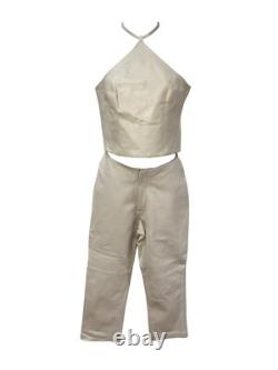 Ensemble haut à col halter en cuir crème et pantalon taille haute de la collection Hugo Buscati pour femmes