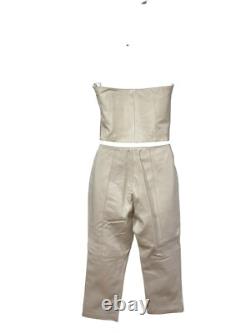 Ensemble haut à col halter en cuir crème et pantalon taille haute de la collection Hugo Buscati pour femmes
