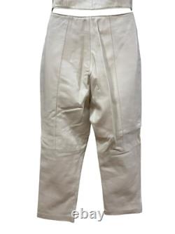 Ensemble haut à col halter en cuir crème et pantalon taille haute de la collection Hugo Buscati pour femmes