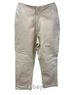 Ensemble haut à col halter en cuir crème et pantalon taille haute de la collection Hugo Buscati pour femmes