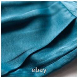 Ensemble haut et pantalon drapé en soie bleu sarcelle taille 4 H18