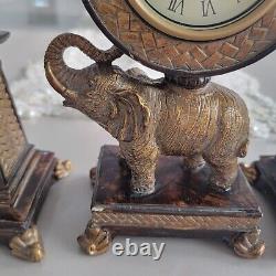 Horloge de table éléphant avec ensemble de deux porte-bougies