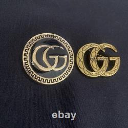 Lot de deux broches Gucci de créateur de marque