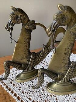 Paire d'anciens serre-livres en laiton vénitien en forme de hippocampe de gondole doré