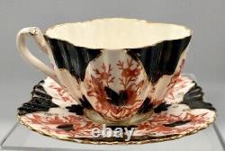 RARE 1887 Wileman Foley Tasse à café et soucoupe en forme d'Alexandra en rouge, noir et or