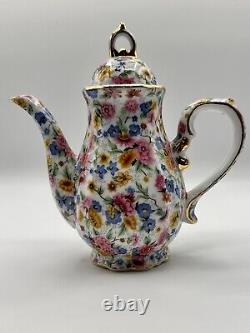 Service à thé pour deux personnes : théière, sucrier, crémier et plateau assortis, à motif de transfert en chintz.