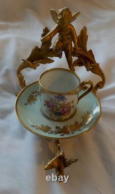 Tasse à demi-café et soucoupe antiques DW Karls Baden Wert Abert Belgique sur support Cupid Stan